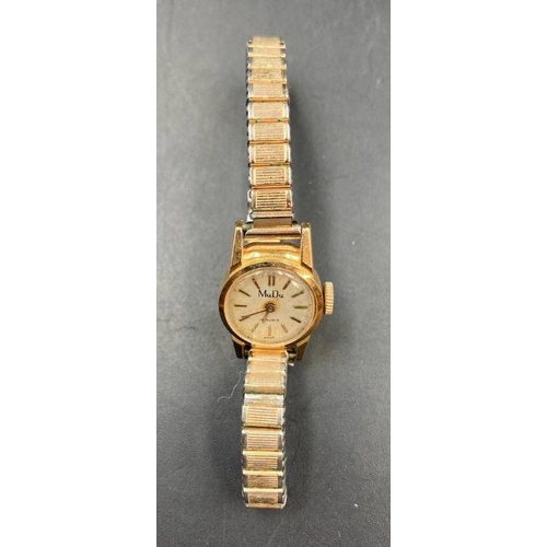 634 - A MuDu ladies vintage wristwatch in 18ct gold with expandable stainless steel band.