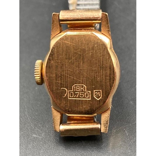 634 - A MuDu ladies vintage wristwatch in 18ct gold with expandable stainless steel band.