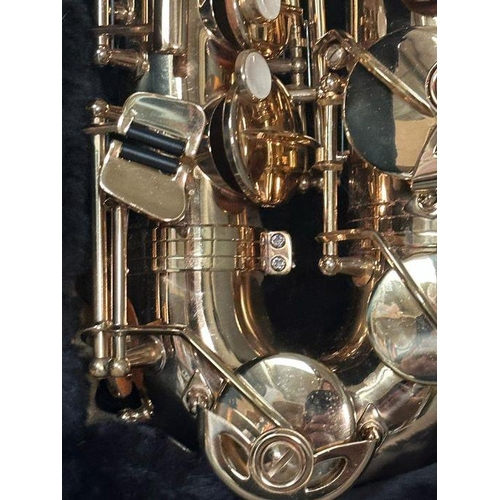 65 - A Jupiter brass Alto saxophone cased