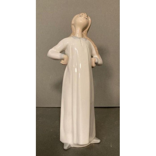 80 - Two Lladro figures of young ladies in night dresses