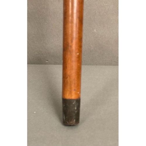 83 - A Mallacca walking cane with engraved silver top engraved in 1901.