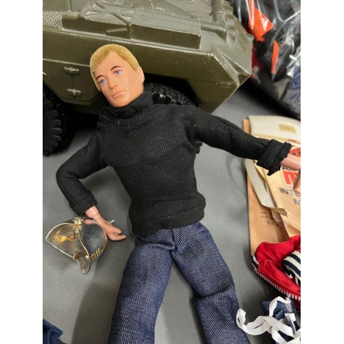 895 - A selection of vintage Action Men, Action Man Jeep and accessories