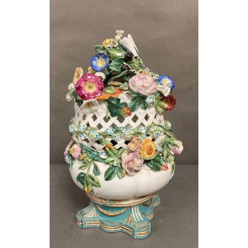 97 - A large porcelain floral centre piece on base by Copeland