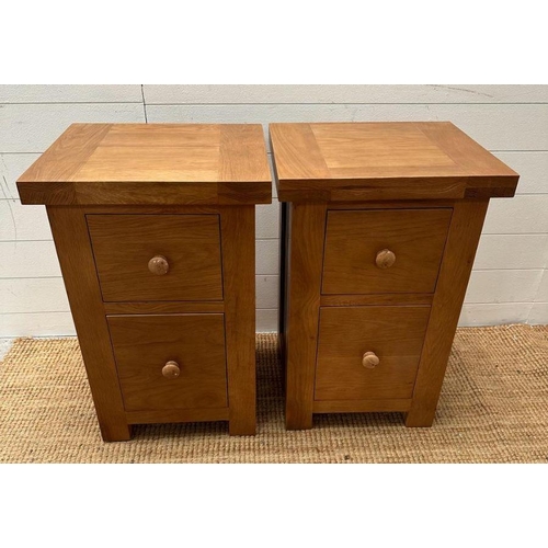 10 - Pair of contemporary oak two drawer bedside tables (H 70cm x W 46cm x D 40cm)