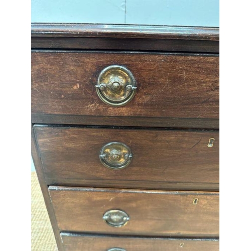 11 - A mahogany four drawer chest of drawers on splade feet on brass drop handles (H 71 cm x D 44cm x W 6... 