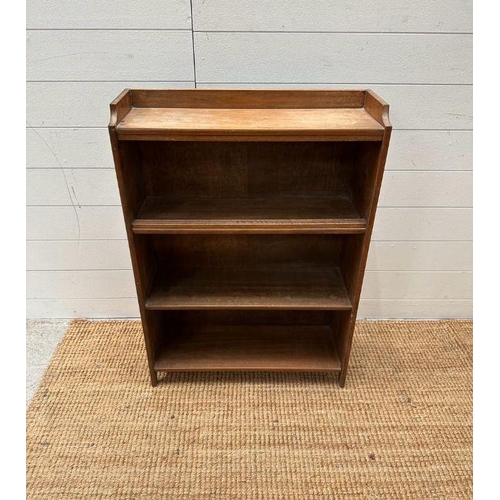 13 - A pine three shelf bookcase with galleried top (H 86cm x D 20cm x W 61cm)