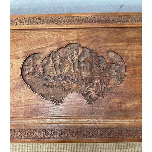 14 - A Camphor chest with Oriental carving depicting boats in a harbour scene with floral boarder ( H 59c... 