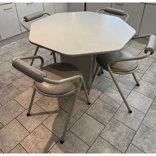 22 - A 1980's white and grey dining table and chairs, octagonal table with tubular frame chairs by Remplo... 