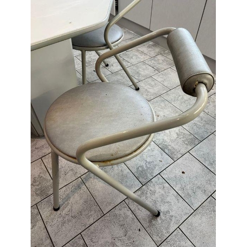 22 - A 1980's white and grey dining table and chairs, octagonal table with tubular frame chairs by Remplo... 