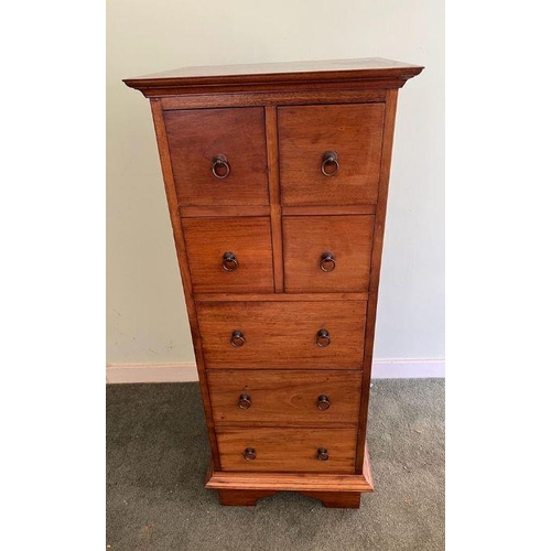 29 - A hardwood tallboy with four short drawers and three long drawers (H112cm W46cm D43cm)