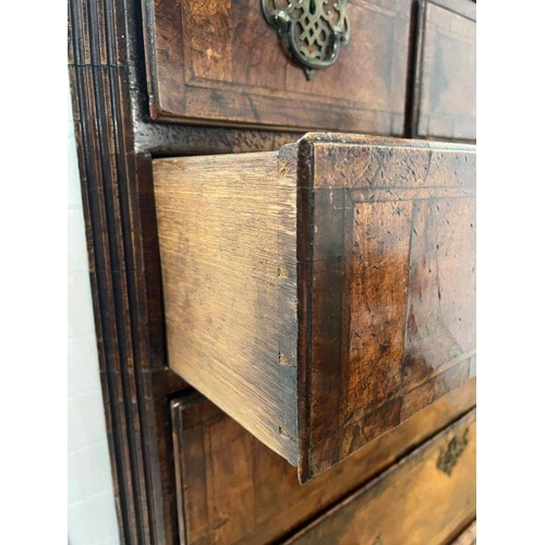 33 - A George III style chest on chest, three small drawers followed by graduated drawers below, two piec... 