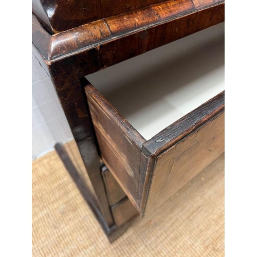 33 - A George III style chest on chest, three small drawers followed by graduated drawers below, two piec... 