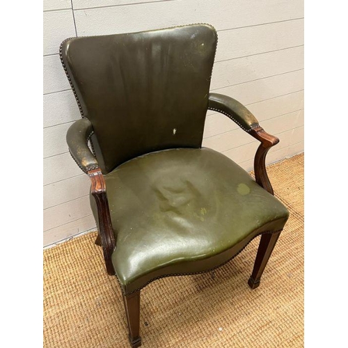 42 - A mahogany and leather desk chairs