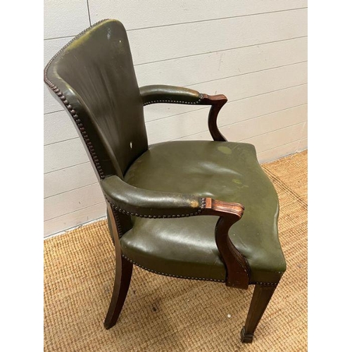 42 - A mahogany and leather desk chairs