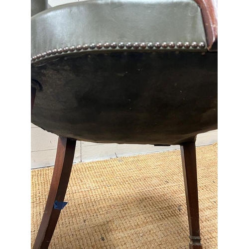 42 - A mahogany and leather desk chairs
