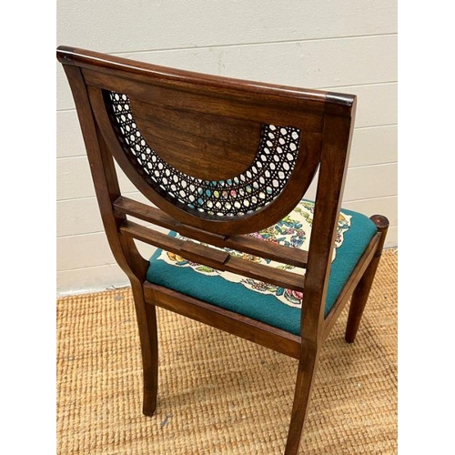45 - An inlaid and cane side chair