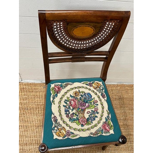 45 - An inlaid and cane side chair