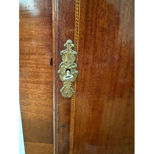 46 - A long hardwood sideboard on bun feet consisting of four drawers and four cupboards with wrought iro... 