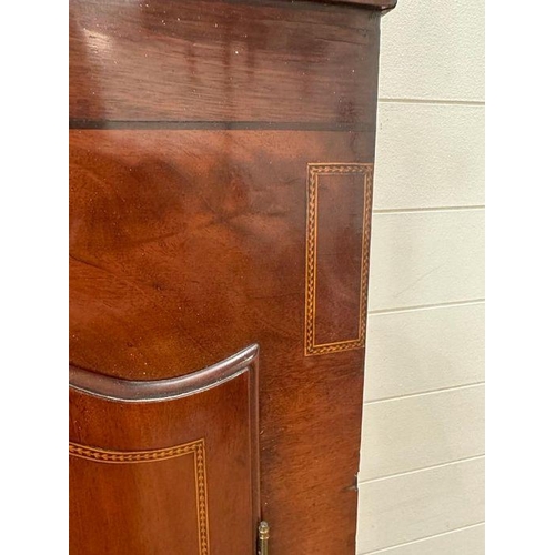 46 - A long hardwood sideboard on bun feet consisting of four drawers and four cupboards with wrought iro... 
