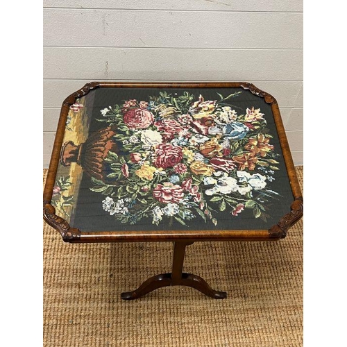 54 - A walnut framed fore screen with needle work to centre