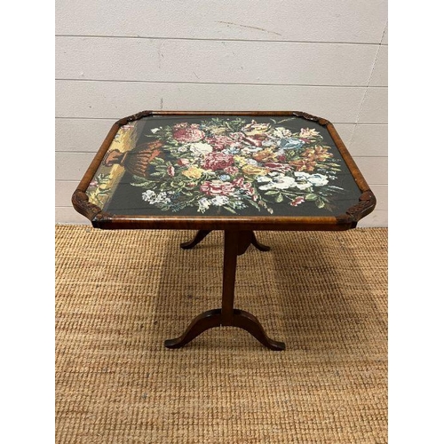 54 - A walnut framed fore screen with needle work to centre