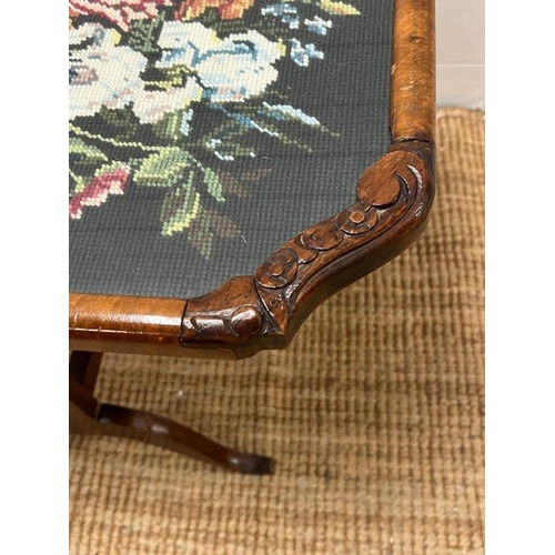 54 - A walnut framed fore screen with needle work to centre