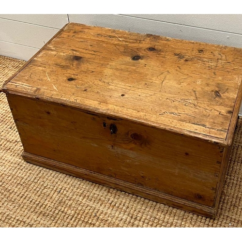 55 - A pine blanket box with iron hinges along with a selection of paper back books (H33cm W69cm D45cm)