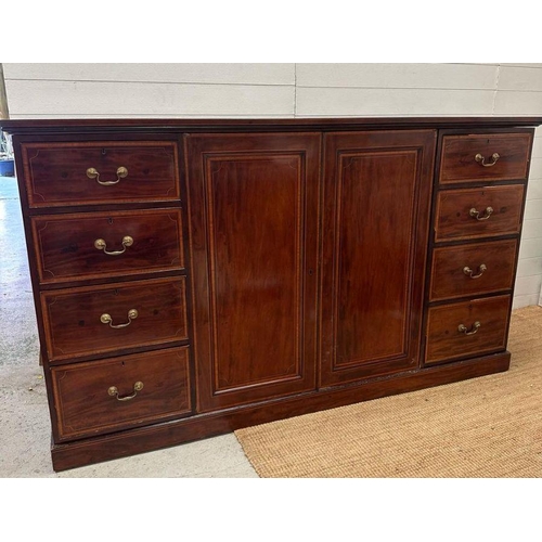 6 - A mahogany gentleman's wardrobe with fruitwood inlay, central doors leading to cupboard with hanging... 
