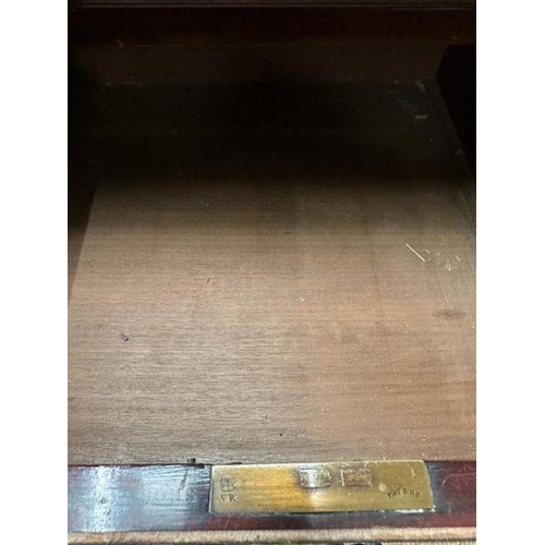 6 - A mahogany gentleman's wardrobe with fruitwood inlay, central doors leading to cupboard with hanging... 