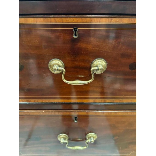 6 - A mahogany gentleman's wardrobe with fruitwood inlay, central doors leading to cupboard with hanging... 