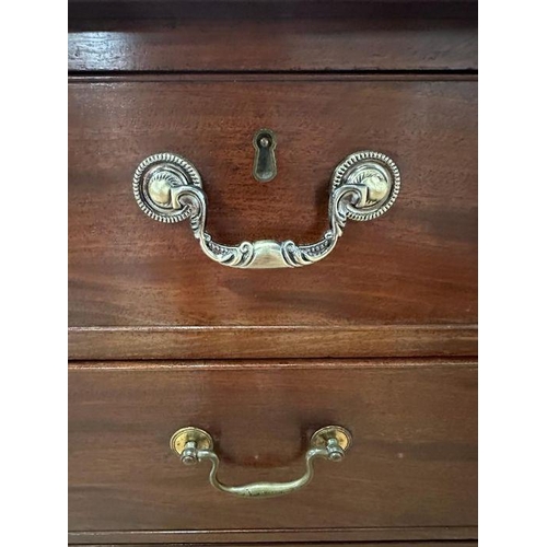 60 - An Edwardian mahogany two over three chest of drawers with string inlay and inlay to top on block fe... 