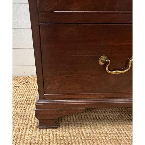 60 - An Edwardian mahogany two over three chest of drawers with string inlay and inlay to top on block fe... 