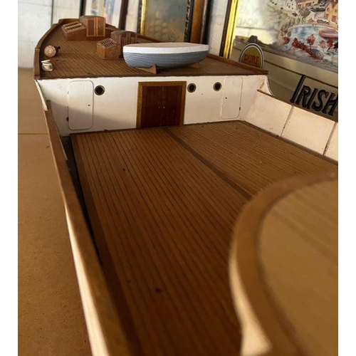 614 - A wooden very large long luxury steam yacht 