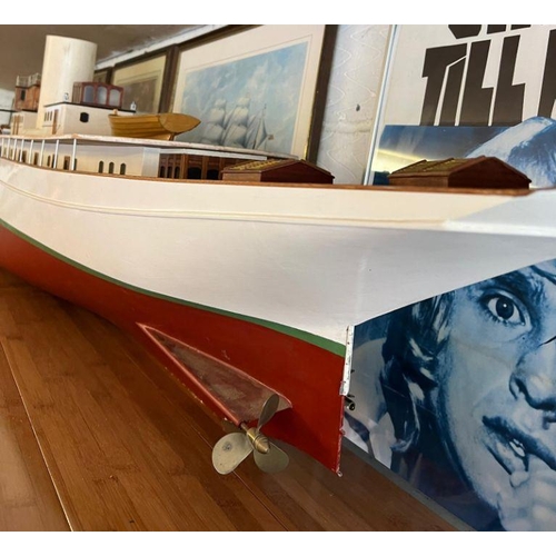614 - A wooden very large long luxury steam yacht 