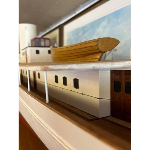614 - A wooden very large long luxury steam yacht 