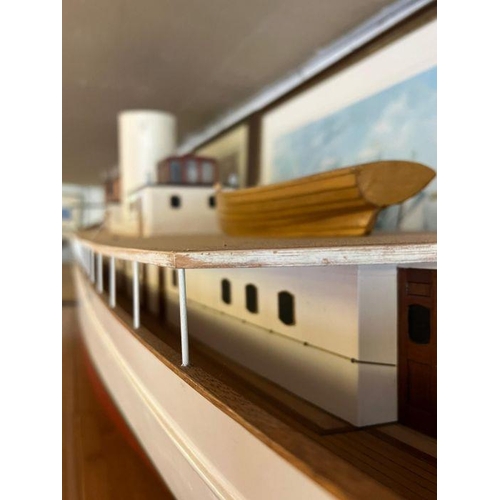 614 - A wooden very large long luxury steam yacht 