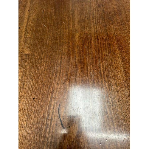 8 - An oak kneehole desk with centre cupboard flanked by three drawers to left and right with brass drop... 