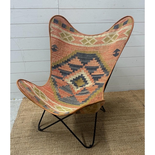 108 - A Buffalo multi coloured butterfly chair.