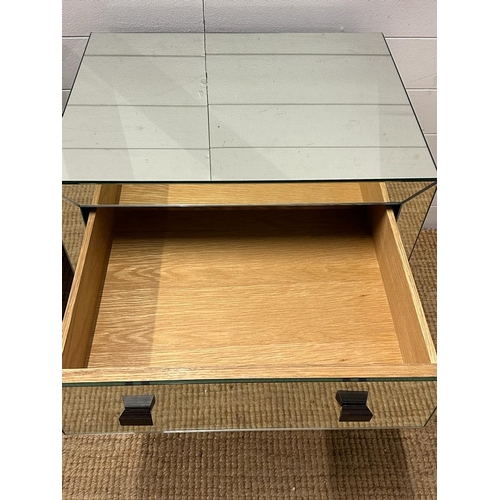 111 - A pair of contemporary mirrored two drawer side tables