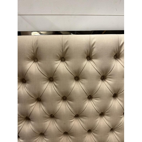 112 - A king size bed with white button backed head board