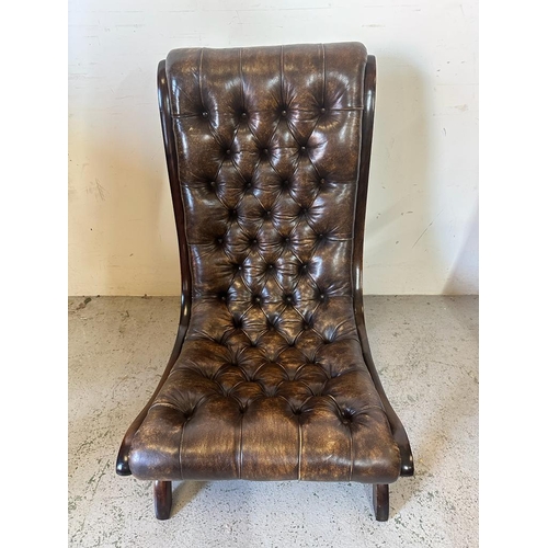 124 - A Regency style brown leather button back salon chair (H101cm W59cm D67cm)