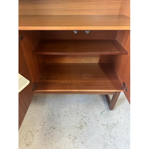 133 - A Mid Century four drawer and two cupboard Highboy by Europa (H 140cm W127cm D50cm)