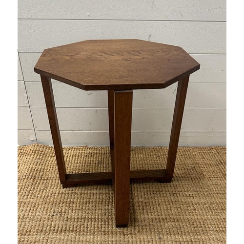 143 - An oak octangular side table (H53cm Dia47cm)