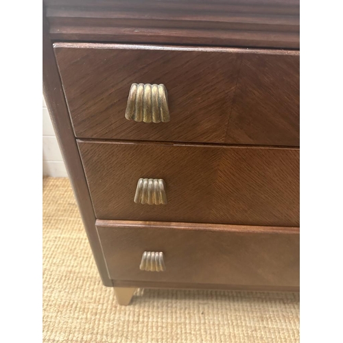 15 - An Art Deco three drawer chest of drawers with galleried top (H76cm W91cm D46cm)