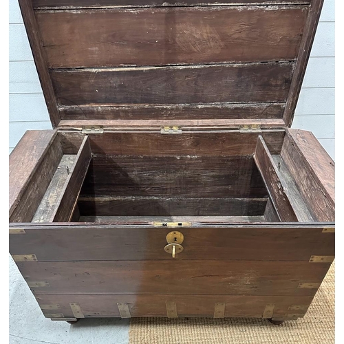 153 - A camphor wood brass banded campaign chest with two inner candle boxes