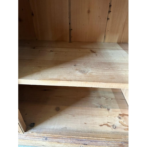 155 - A pine three drawer and three cupboard dresser with two glazed cupboards and three drawers over (H19... 