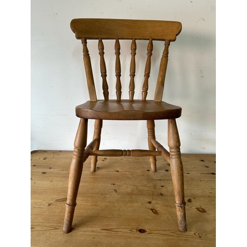 157 - A pine kitchen table with four chairs (H78cm W152cm D88cm)