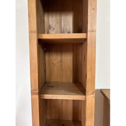 159 - A pine five shelve bookcase and a pine five shelve Cd rack (H199cm and H130cm)