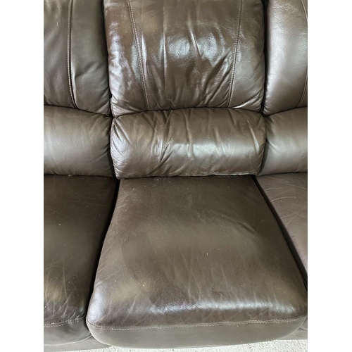 161 - A brown leather three seater recliner sofa (H103cm D57cm W212cm)