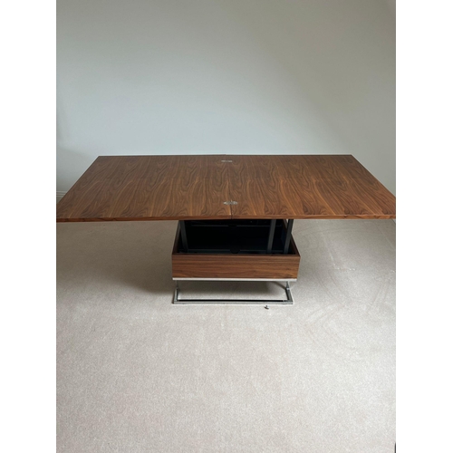 171 - A contemporary square coffee table on chrome legs.